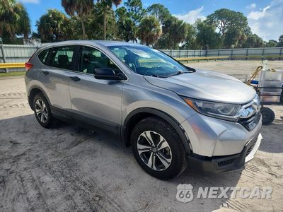 Czwarte zdjęcie samochodu z boku: 2019 HONDA CR-V LX VIN:2HKRW6H3XKH208058 - miniatura