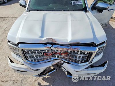 Zdjęcie 11 z 12 samochodu: 2017 GMC SIERRA K1500 DENALI VIN:3GTU2PEJ3HG355841 - miniatura