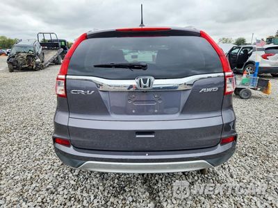 Zdjęcie 6 z 14 samochodu: 2016 HONDA CR-V EXL VIN:2HKRM4H73GH709569 - miniatura