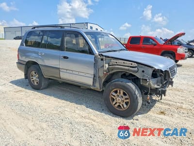 Czwarte zdjęcie samochodu z boku: 2002 LEXUS LX 470 VIN:JTJHT00W823522517 - miniatura