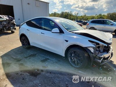 Czwarte zdjęcie samochodu z boku: 2025 TESLA MODEL Y VIN:7SAYGDEE7SA344231 - miniatura