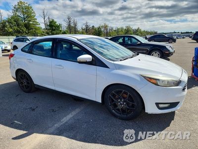 Czwarte zdjęcie samochodu z boku: 2016 FORD FOCUS SE VIN:1FADP3F21GL223654 - miniatura