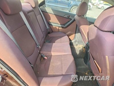 Zdjęcie 10 z 12 samochodu: 2010 KIA FORTE EX VIN:KNAFU4A2XA5849169 - miniatura