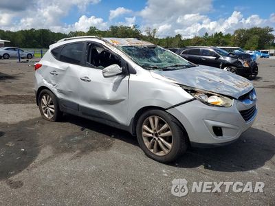 Czwarte zdjęcie samochodu z boku: 2011 HYUNDAI TUCSON LIMITED VIN:KM8JU3AC7BU135003 - miniatura