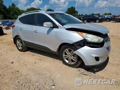 Czwarte zdjęcie samochodu z boku: 2013 HYUNDAI TUCSON GLS VIN:KM8JU3ACXDU573288 - miniatura