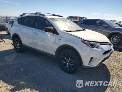 Czwarte zdjęcie samochodu z boku: 2018 TOYOTA RAV4 HV SE VIN:JTMJJREV9JD238322 - miniatura