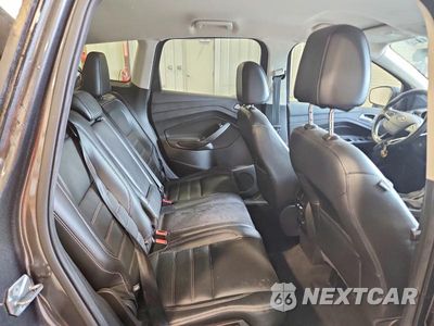 Zdjęcie 11 z 13 samochodu: 2017 FORD ESCAPE TITANIUM VIN:1FMCU9J94HUD57989 - miniatura