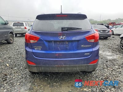 Zdjęcie 6 z 13 samochodu: 2010 HYUNDAI TUCSON GLS VIN:KM8JUCAC6AU081594 - miniatura