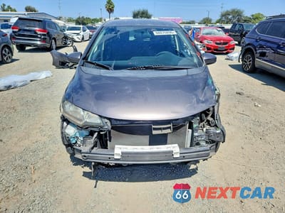 Piąte zdjęcie samochodu w środku: 2017 HONDA FIT LX VIN:JHMGK5H50HS000519 - miniatura