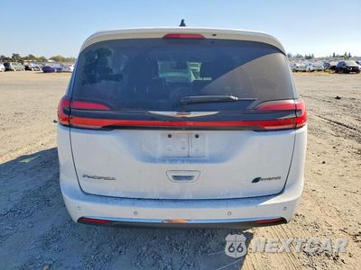 Zdjęcie 6 z 14 samochodu: 2023 CHRYSLER PACIFICA HYBRID TOURING L VIN:2C4RC1L7XPR558970 - miniatura