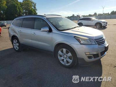 Czwarte zdjęcie samochodu z boku: 2016 CHEVROLET TRAVERSE LT VIN:1GNKRGKD1GJ295712 - miniatura