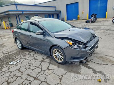 Czwarte zdjęcie samochodu z boku: 2016 FORD FOCUS SE VIN:1FADP3F22GL211447 - miniatura