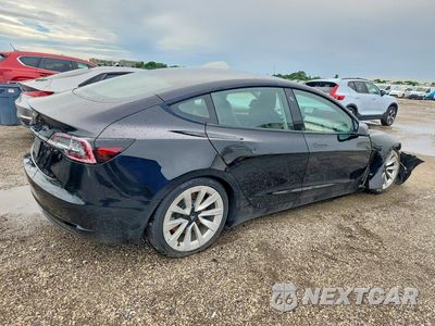 Trzecie zdjęcie samochodu z tyłu: 2023 TESLA MODEL 3 VIN:5YJ3E1EA4PF435444 - miniatura