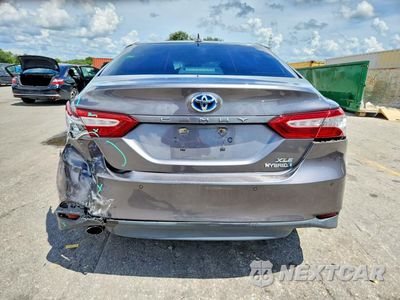 Zdjęcie 6 z 12 samochodu: 2018 TOYOTA CAMRY HYBRID XLE VIN:4T1B21HK6JU505626 - miniatura