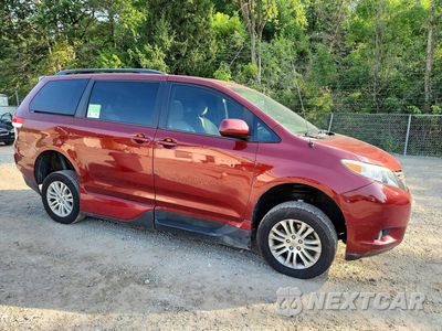 Czwarte zdjęcie samochodu z boku: 2014 TOYOTA SIENNA XLE 8-PASSENGER VIN:5TDYK3DC9ES496262 - miniatura