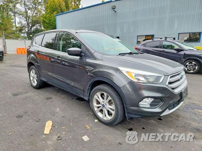 Czwarte zdjęcie samochodu z boku: 2017 FORD ESCAPE SE VIN:1FMCU9GD2HUD66637 - miniatura