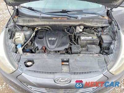 Zdjęcie 11 z 12 samochodu: 2014 HYUNDAI TUCSON SE VIN:KM8JU3AG2EU861570 - miniatura