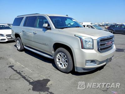 Czwarte zdjęcie samochodu z boku: 2015 GMC YUKON XL K1500 SLT VIN:1GKS2HKC6FR235407 - miniatura