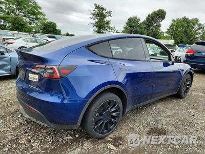 Trzecie zdjęcie samochodu z tyłu: 2023 TESLA MODEL Y VIN:7SAYGAEE3PF632482 - miniatura