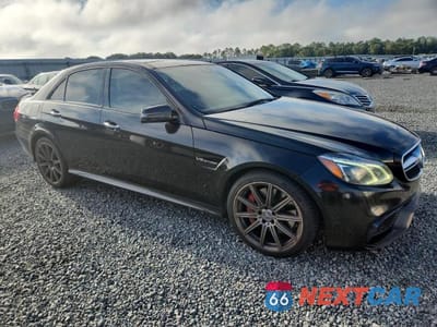 Czwarte zdjęcie samochodu z boku: 2016 MERCEDES-BENZ E 63 AMG-S VIN:WDDHF7GB9GB301694 - miniatura