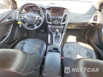 Zdjęcie 8 z 12 samochodu: 2012 FORD FOCUS TITANIUM VIN:1FAHP3N25CL304802 - miniatura