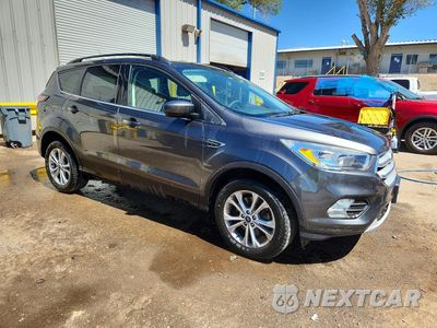 Czwarte zdjęcie samochodu z boku: 2018 FORD ESCAPE SE VIN:1FMCU9GD0JUC87506 - miniatura