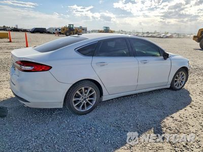 Trzecie zdjęcie samochodu z tyłu: 2017 FORD FUSION SE HYBRID VIN:3FA6P0LU5HR223219 - miniatura