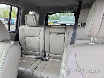 Zdjęcie 10 z 14 samochodu: 2014 HONDA PILOT EXL VIN:5FNYF4H5XEB049773 - miniatura
