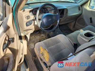 Zdjęcie 8 z 12 samochodu: 2002 FORD F150 VIN:2FTRX18W02CA81711 - miniatura