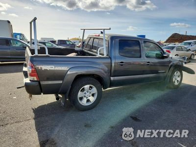 Trzecie zdjęcie samochodu z tyłu: 2015 TOYOTA TACOMA V6 VIN:3TMLU4EN2FM200624 - miniatura