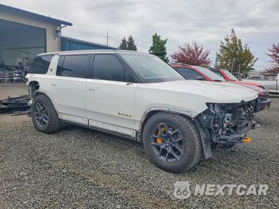 Czwarte zdjęcie samochodu z boku: 2023 RIVIAN R1S ADVENTURE VIN:7PDSGABA5PN016801 - miniatura