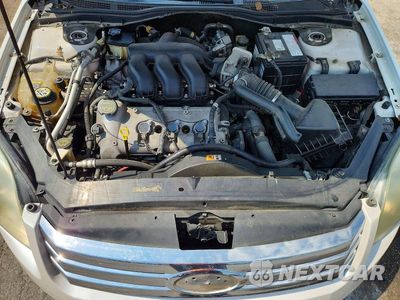 Zdjęcie 11 z 12 samochodu: 2009 FORD FUSION SE VIN:3FAHP07179R114822 - miniatura