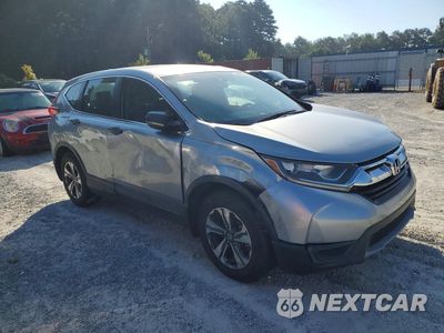 Czwarte zdjęcie samochodu z boku: 2017 HONDA CR-V LX VIN:7FARW5H36HE000796 - miniatura