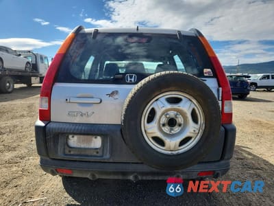 Zdjęcie 6 z 13 samochodu: 2002 HONDA CR-V LX VIN:JHLRD684X2C002459 - miniatura