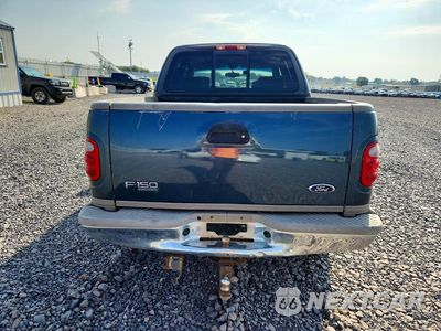Zdjęcie 6 z 13 samochodu: 2001 FORD F150 KING RANCH VIN:1FTRW07L71KF75126 - miniatura