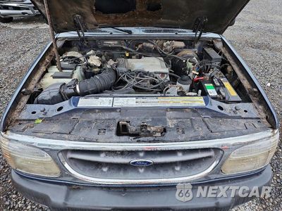 Zdjęcie 12 z 13 samochodu: 1999 FORD EXPLORER VIN:1FMDU35P1XZA34687 - miniatura
