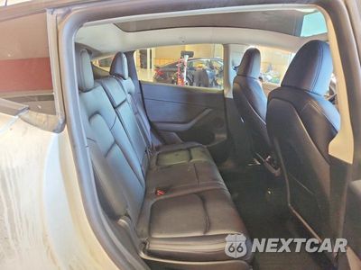 Zdjęcie 10 z 12 samochodu: 2023 TESLA MODEL Y VIN:7SAYGAEE5PF808402 - miniatura