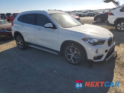 Czwarte zdjęcie samochodu z boku: 2018 BMW X1 SDRIVE28I VIN:WBXHU7C34J3H43479 - miniatura
