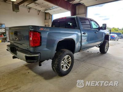 Trzecie zdjęcie samochodu z tyłu: 2014 CHEVROLET SILVERADO K1500 LTZ VIN:3GCUKSEC7EG449205 - miniatura