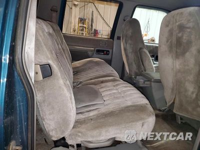 Zdjęcie 11 z 13 samochodu: 1993 CHEVROLET SUBURBAN K1500 VIN:1GNFK16K2PJ382191 - miniatura