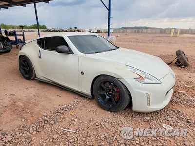 Czwarte zdjęcie samochodu z boku: 2016 NISSAN 370Z SPORT VIN:JN1AZ4EH5GM936041 - miniatura