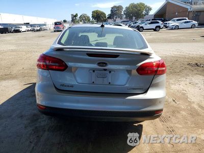 Zdjęcie 6 z 12 samochodu: 2016 FORD FOCUS TITANIUM VIN:1FADP3J22GL203520 - miniatura