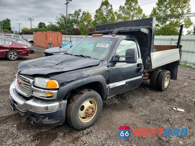 2004 GMC SIERRA DUMP TRUCK 1GDJK34UX4E222255 - główne zdjęcie licytacji z USA - miniatura