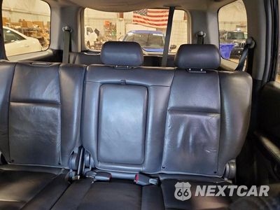 Zdjęcie 10 z 13 samochodu: 2005 HONDA PILOT EXL VIN:5FNYF185X5B052574 - miniatura