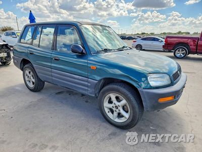 Czwarte zdjęcie samochodu z boku: 1997 TOYOTA RAV4 BASE VIN:JT3GP10V5V7019593 - miniatura