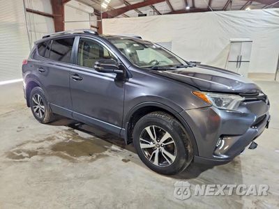 Czwarte zdjęcie samochodu z boku: 2018 TOYOTA RAV4 XLE VIN:JTMRFREV7JJ738632 - miniatura