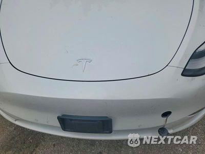 Zdjęcie 11 z 12 samochodu: 2021 TESLA MODEL Y VIN:5YJYGAEEXMF207589 - miniatura