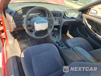 Zdjęcie 8 z 13 samochodu: 1999 FORD MUSTANG VIN:1FAFP4043XF159334 - miniatura