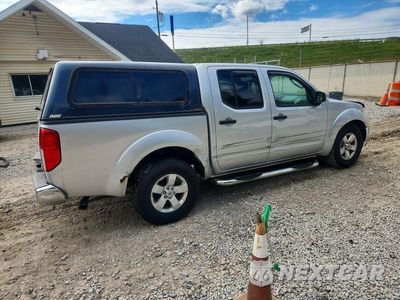 Trzecie zdjęcie samochodu z tyłu: 2010 NISSAN FRONTIER SE V6 VIN:1N6AD0ER7AC427995 - miniatura