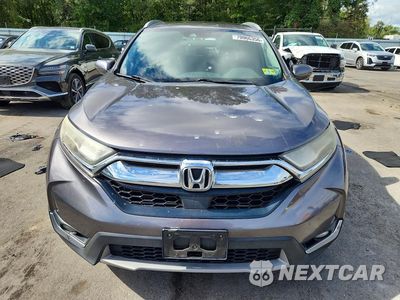 Piąte zdjęcie samochodu w środku: 2019 HONDA CR-V TOURING VIN:JHLRW2H99KX019440 - miniatura